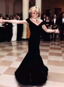 A person dancing in a dressDescription automatically generated with medium confidence