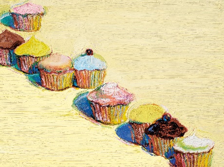 9 cupcakes on a yellow tableDescription automatically generated