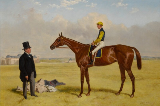 A racehorse, jockey, and owner on a racecourse.Description automatically generated